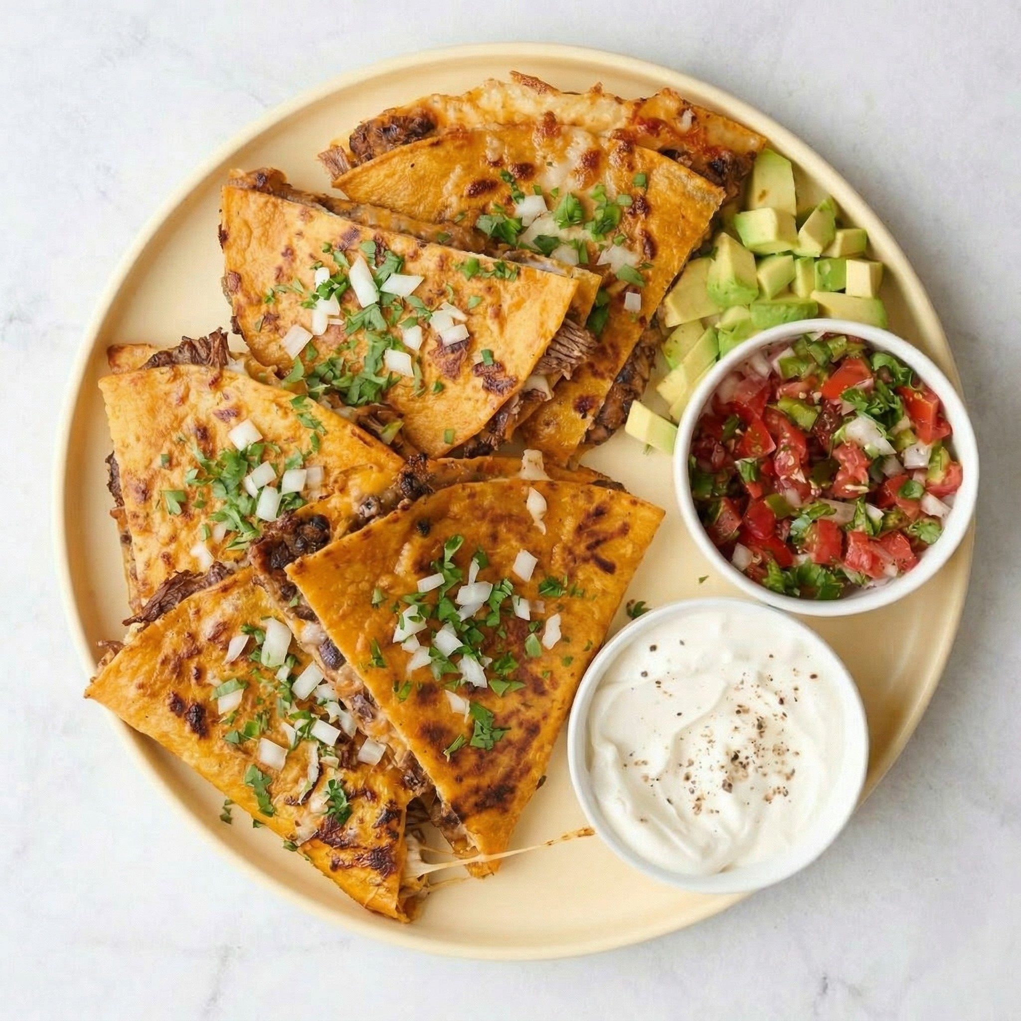 BEEF BIRRIA QUESADILLA.